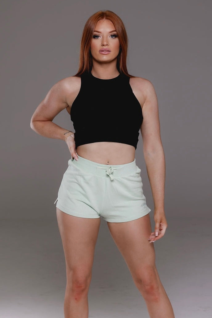 Shorts in mint from Stormm Co's Hues of Happiness collection, made from soft, lightweight French terry cotton, drawstring waist, and comfortable, relaxed fit.