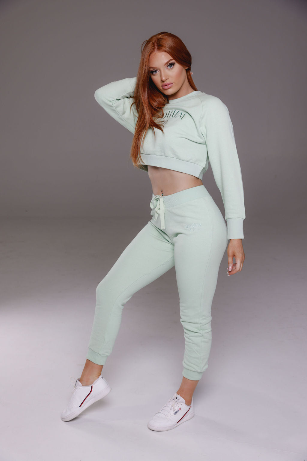 Cropped jumper in mint from Stormm Co's Hues of Happiness collection, made from soft French terry cotton, relaxed fit, and embroidered unique design.