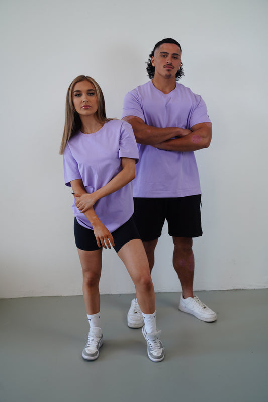 Unisex purple t-shirt with short sleeves and a round neckline, made from soft 100% cotton